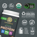 Sunwarrior organic active protein powder container with certification and recycling icons on dark background