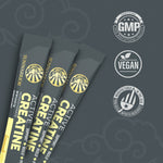 Three gray Sunwarrior Active Creatine stick packs with lemonade flavor text, next to GMP, vegan, and made in the USA certification logos.