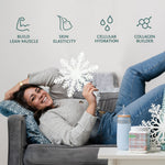 Woman relaxing on couch holding snowflake cutout near collagen powder container and reusable cup on table