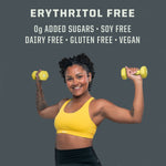 Woman in yellow sports bra lifting yellow dumbbells with text highlighting erythritol free, 0g added sugars, soy free, dairy free, gluten free, and vegan.