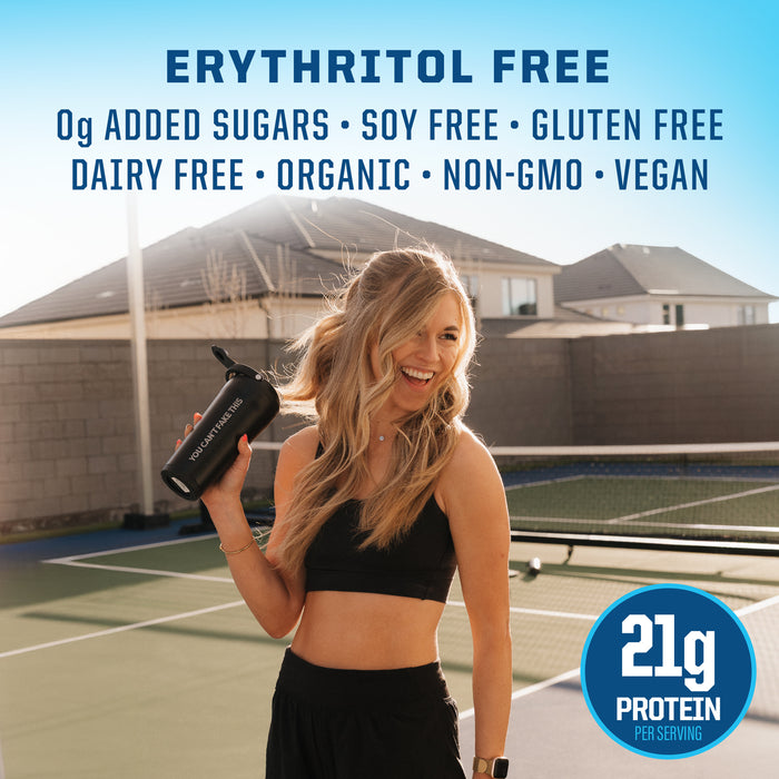 Woman in black workout clothes holding a shaker bottle outside with health benefits listed above her head