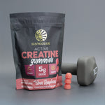 Sunwarrior creatine gummies pouch with stacked sour raspberry gummies and a 10-pound gray dumbbell.