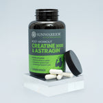 Black bottle of Sunwarrior post-workout creatine 3000 and astragin capsules with some capsules spilling out next to the open lid on a clear square block.