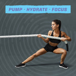 Athletic woman in black sportswear performing a side lunge while pulling a thick battle rope against a gray background with the words 