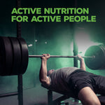 Man lifting heavy barbell on bench press in gym with green lighting and text reading active nutrition for active people above.