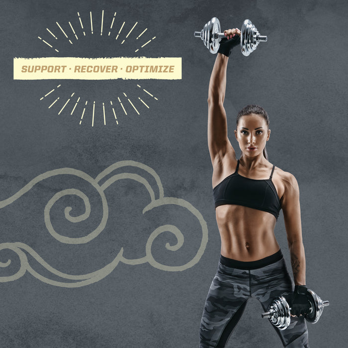 Fit woman in workout gear lifting dumbbells with 