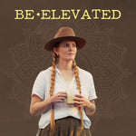 Woman holding a mug with 'BE•ELEVATED' text above on a patterned background