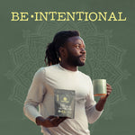 Man holding a matcha and mushroom wellness powder packet and green mug against mandala background