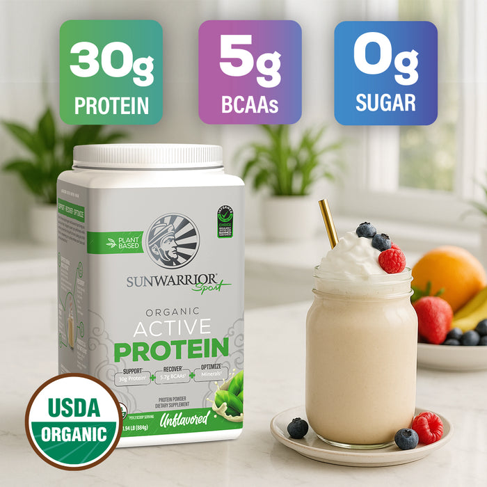 Sunwarrior organic plant-based protein powder container next to a creamy smoothie with berries and straw