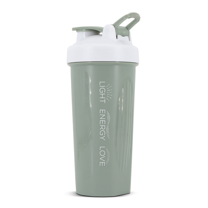 Green protein shaker bottle with white lid and text 