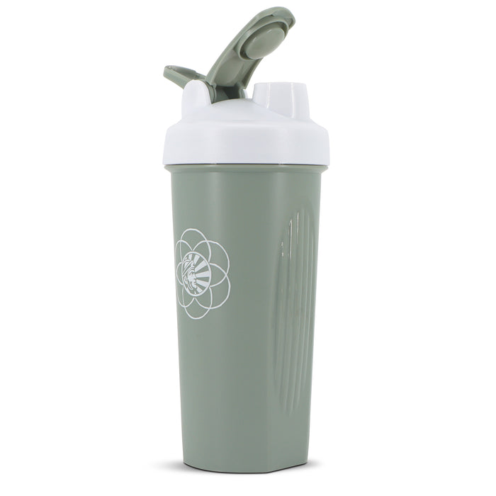 Green shaker bottle with white flip-top lid and geometric sun logo on front