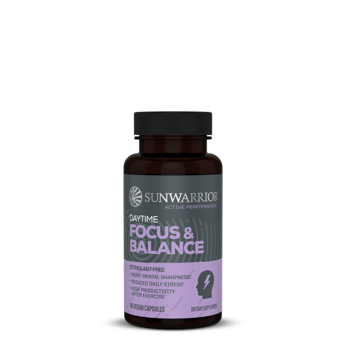 Bottle of Sunwarrior dietary supplement labeled Daytime Focus & Balance with vegan capsules, featuring claims of stimulant-free, more mental sharpness, reduced daily stress, and high productivity after exercise.